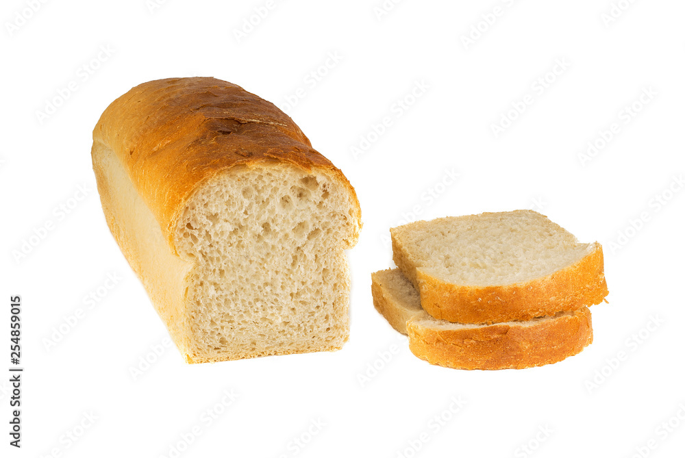 A traditional square loaf of bread is isolated on a white background.   bread isolated on a white background. square loaf of bread with two pieces cut off on a white background. 