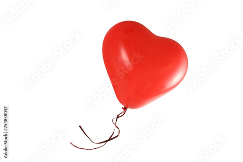 red balloon in heart shape isolated on a white background, love symbol, copy space