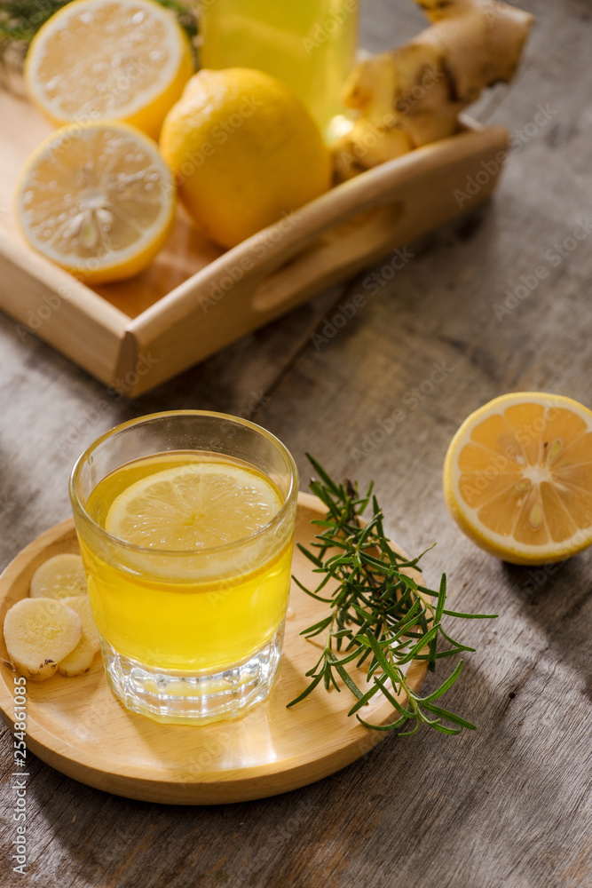 Homemade lemon and ginger organic probiotic drink, copy space. Homemade lemon and ginger organic probiotic drink, copy space.