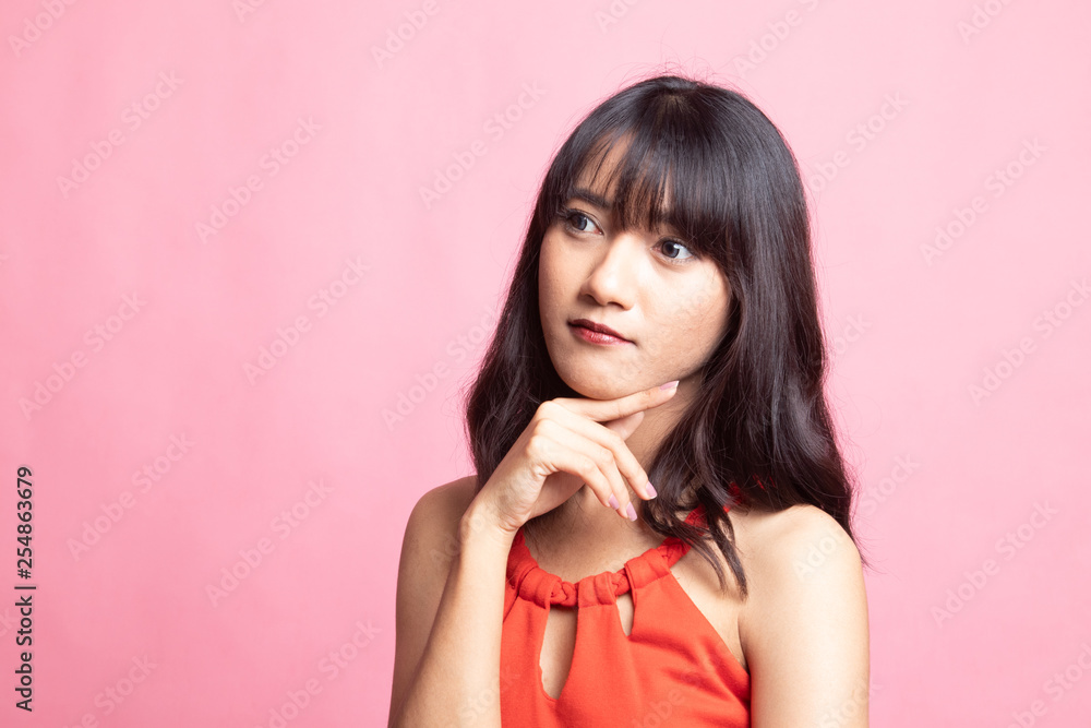 Serious young Asian woman look away. Serious young Asian woman look away.