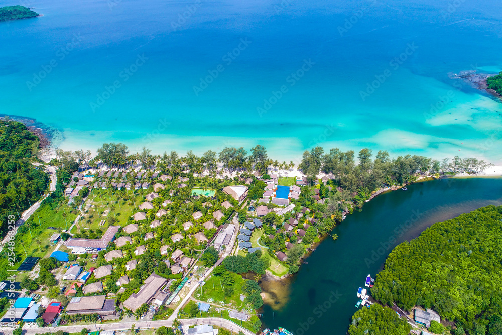 Aerial view of mangrove tropical rainforest with river from mountain to sea