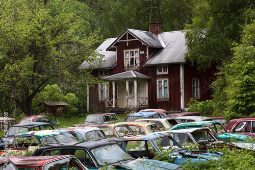 The Bastnas car graveyard lies in a Swedish forest and reportedly contains the the rusting carcasses of 1,000 abandoned cars. photo