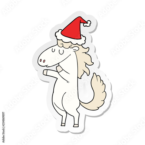 sticker cartoon of a horse wearing santa hat