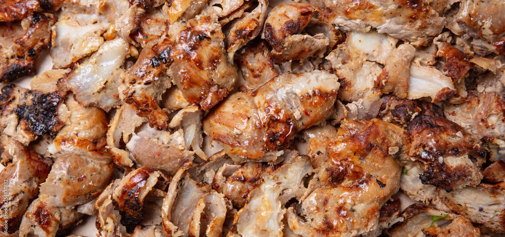 Shawarma, gyros background. Traditional turkish, greek meat food, closeup view Shawarma, gyros background. Traditional turkish, greek meat food, closeup view