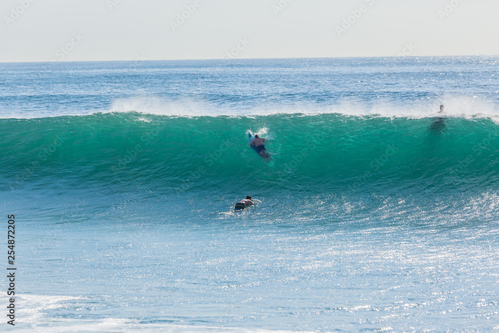 Surfers Escape Push Under Submerge Surfboards Ocean Wave