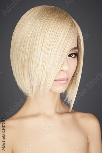 Lovely asian woman with blonde short hair