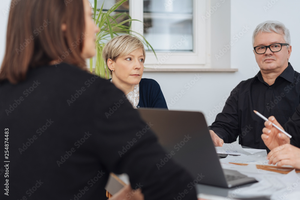 Diverse group of businesspeople in a meeting Diverse group of businesspeople in a meeting