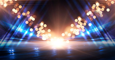 Wet asphalt, reflection of neon lights, a searchlight, smoke. Abstract light in a dark empty street with smoke, smog. Dark background scene of empty street, night view, night city.