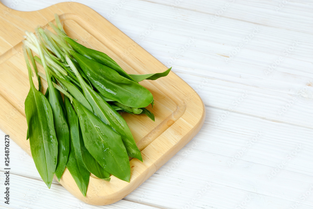 Ramson or wild garlic on a cutting board Ramson or wild garlic on a cutting board