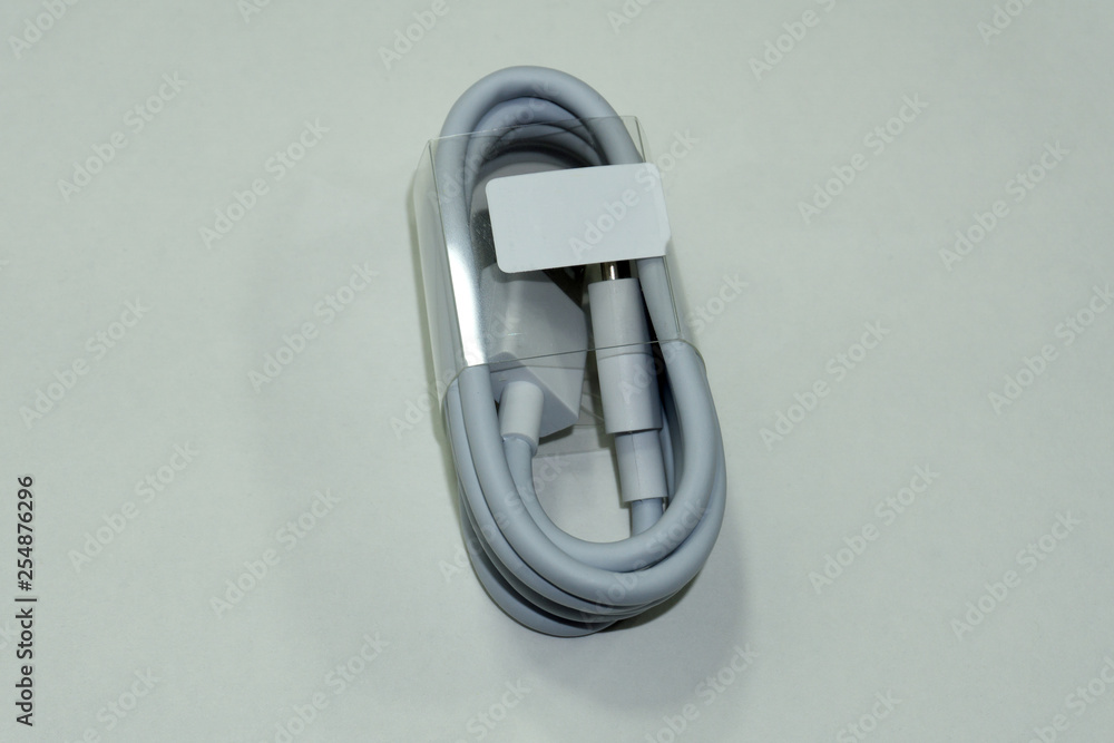 Close up white USB cable plug isolated on white background . Close up white USB cable plug isolated on white background .