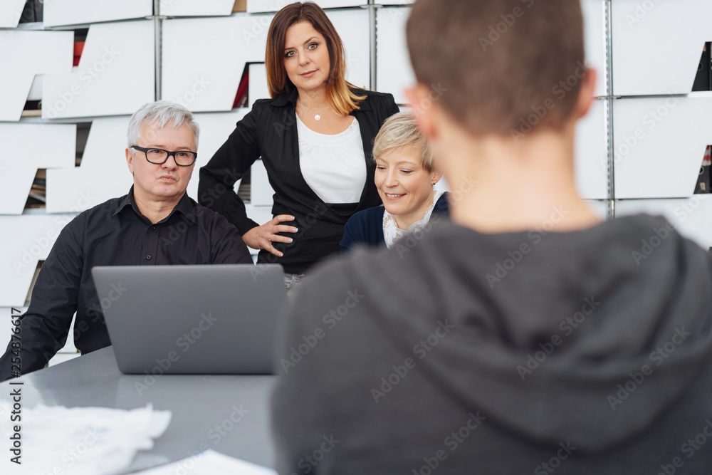 Group of businesspeople in a strategy meeting Group of businesspeople in a strategy meeting