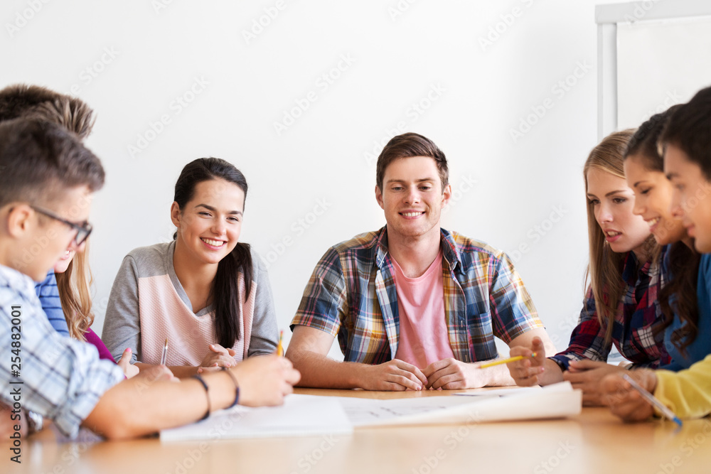 education, architecture and people concept - group of smiling students meeting at school education, architecture and people concept - group of smiling students meeting at school