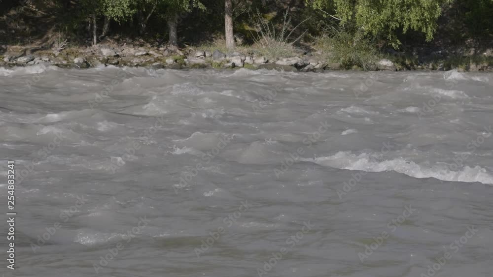 Waves, spray and foam, river Katun in Altai mountains. Siberia, Russia. Waves, spray and foam, river Katun in Altai mountains. Siberia, Russia.