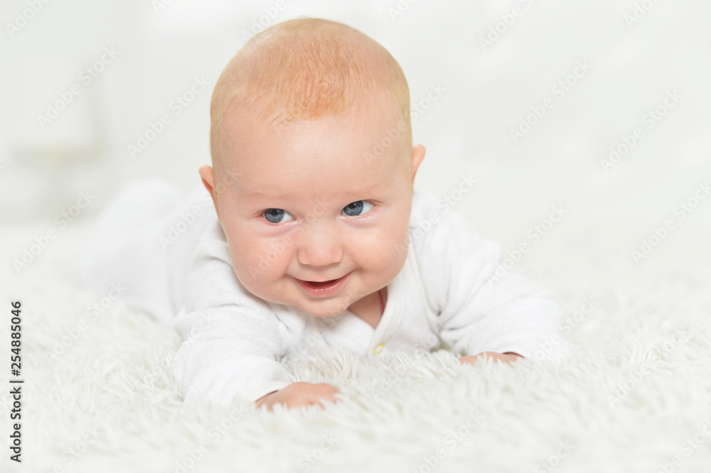 Portrait of beautiful baby boy on bed Portrait of beautiful baby boy on bed