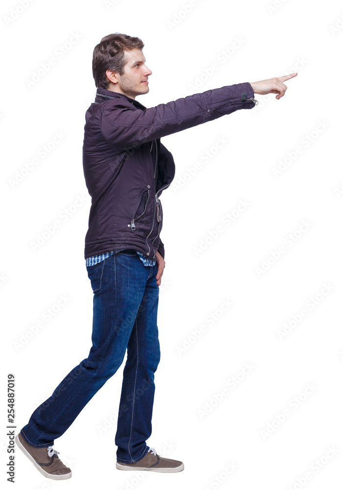 Side view of a man walking with a pointing hand. Side view of a man walking with a pointing hand.