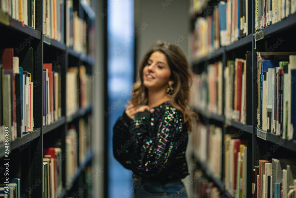 young woman in library young woman in library