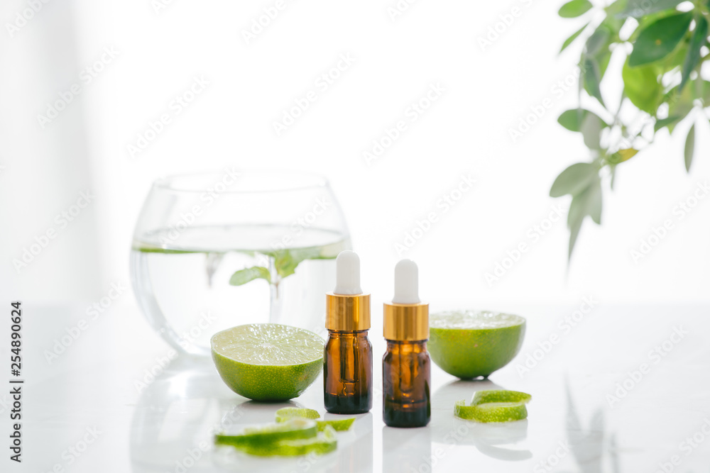 Citrus oil lemon natural over bright background Citrus oil lemon natural over bright background