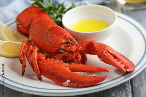 Lobster on plate with lemon and parsley