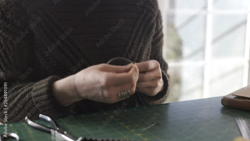 Sewing a leather keychain Sewing a leather keychain