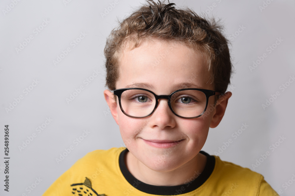child with glasses child with glasses