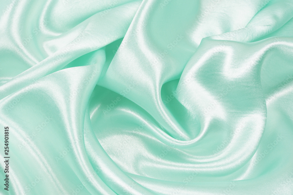 Fototapeta premium Smooth elegant blue silk or satin texture can use as abstract background