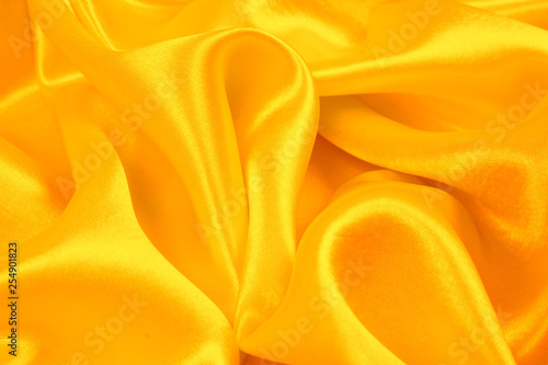 Orange silk texture luxurious satin for abstract background, Fabric texture