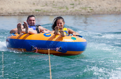 Young couiple on water attractions during summer vacations © Andriy Petrenko