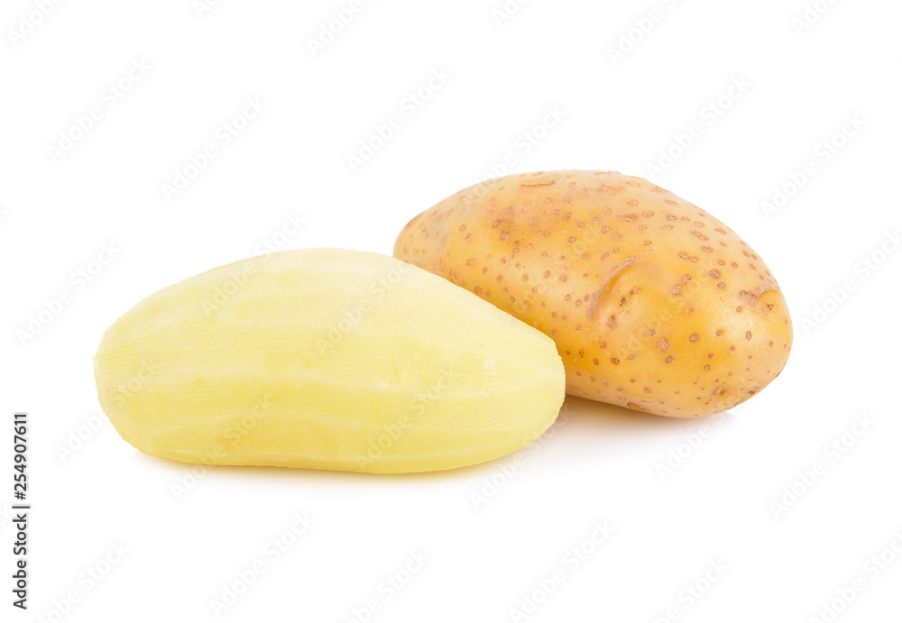 peeled and unpeeled fresh potato on white background