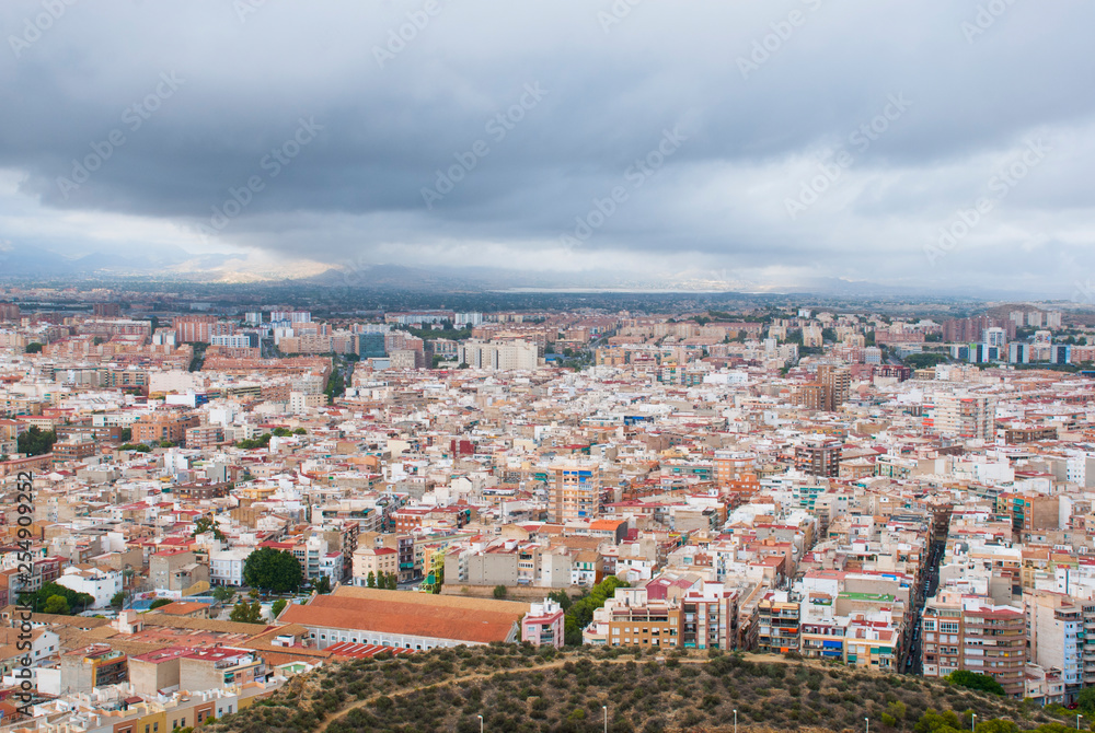 Panoramic view for city Alicante in spain. Cityscape with cloudy sky.
