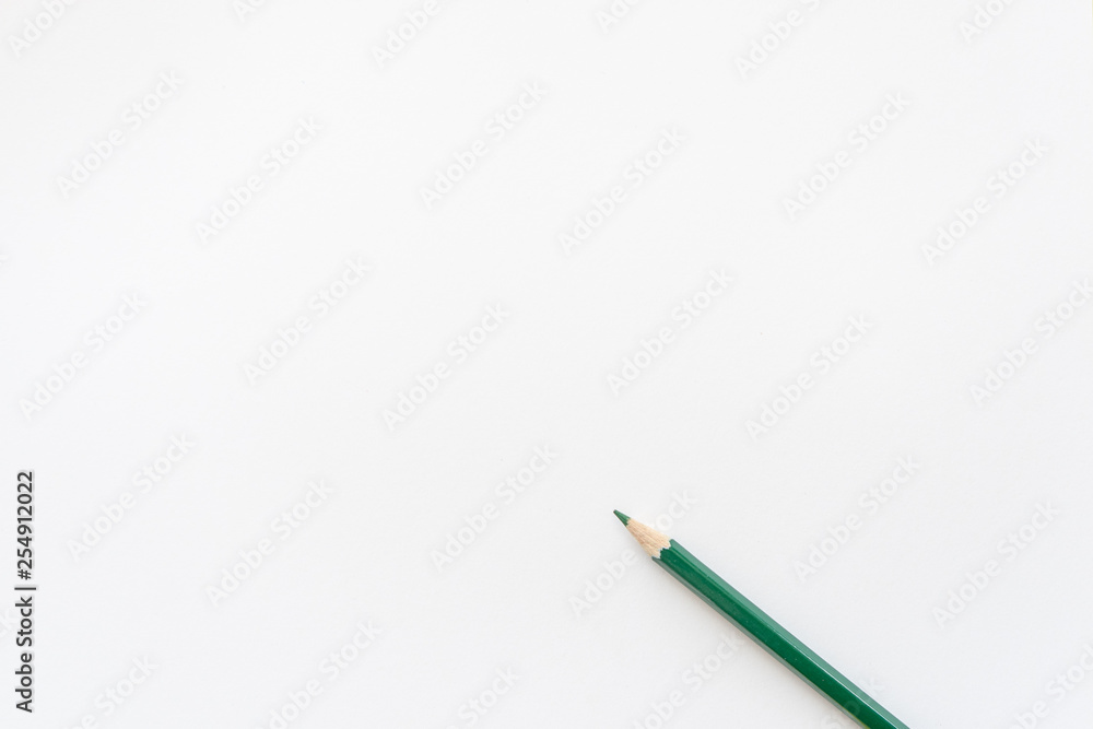 Green pencil on white background. Top view Green pencil on white background. Top view