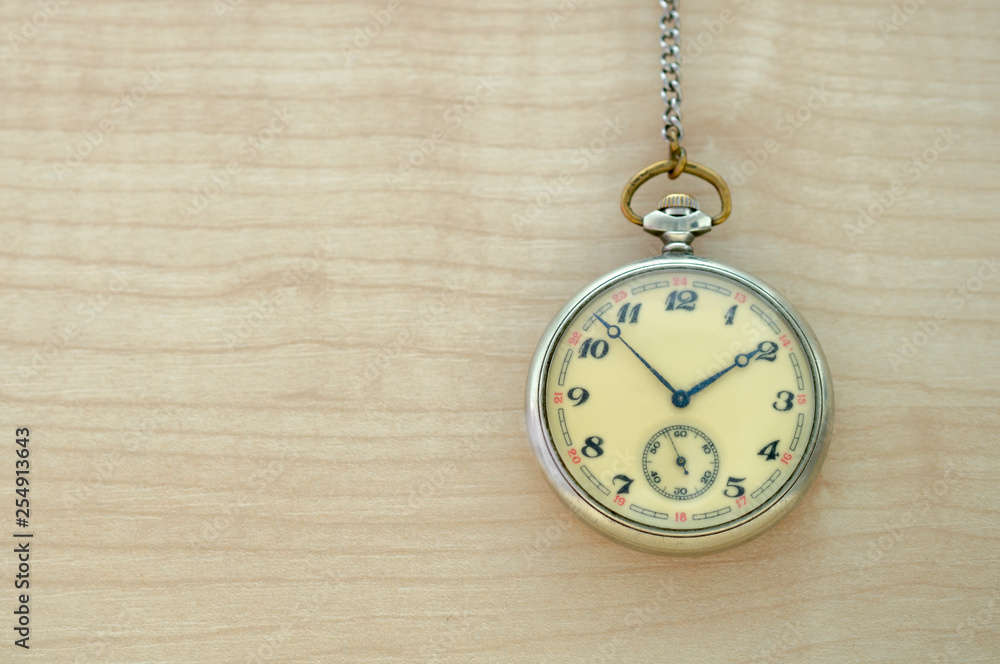mechanical hand watch on wooden background mechanical hand watch on wooden background