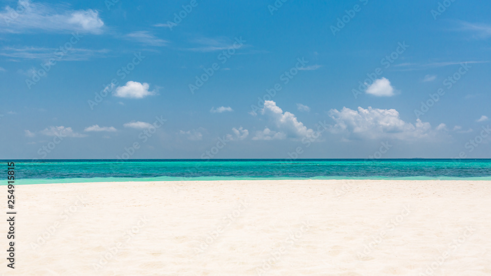 Empty beach scene with white sand and blue sea view. Sea sand sky concept