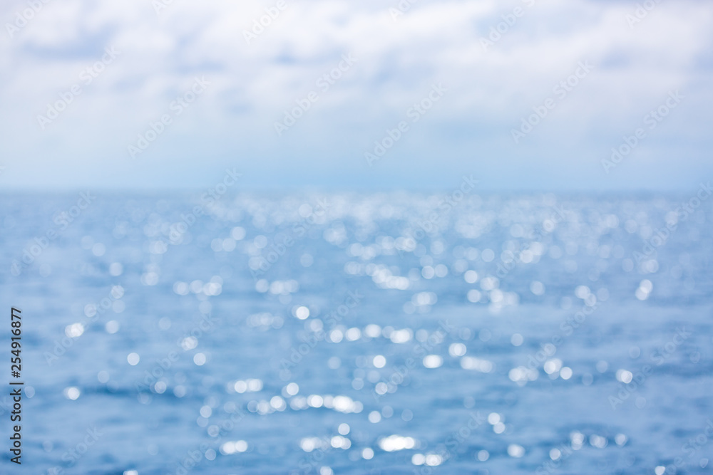 Obraz premium Blurred blue background and blue sky and bokeh sea. Sea nature environment, endless sea view