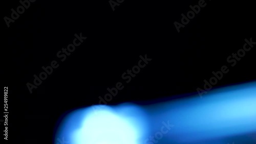 Blue lines of light circling and moving. Light effects in 4k quality. Beautiful blue light effect. photo