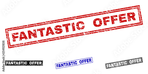 Grunge FANTASTIC OFFER rectangle stamp seals isolated on a white background. Rectangular seals with grunge texture in red, blue, black and grey colors.