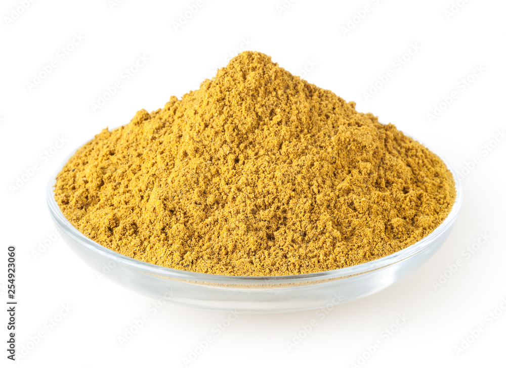 Curry powder in glass plate isolated on white background Curry powder in glass plate isolated on white background