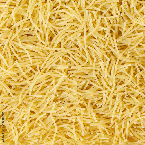 Uncooked vermicelli pasta background