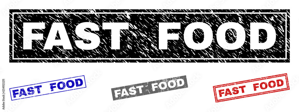 Grunge FAST FOOD rectangle stamp seals isolated on a white background. Rectangular seals with distress texture in red, blue, black and gray colors. Grunge FAST FOOD rectangle stamp seals isolated on a white background. Rectangular seals with distress texture in red, blue, black and gray colors.