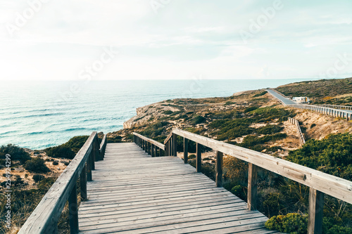 Wooden Stair Leading To Beautiful Beach With Turquoise Water In Algarve, Portugal