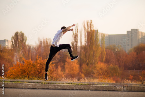 Man run at autumn morning. Healthy lifestyle concept