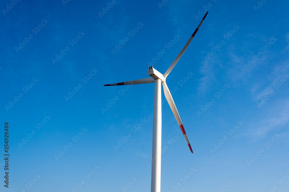 White modern windmill with three blades in Rajasthan