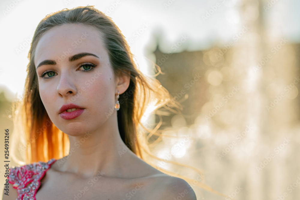 young woman in pink dress young woman in pink dress