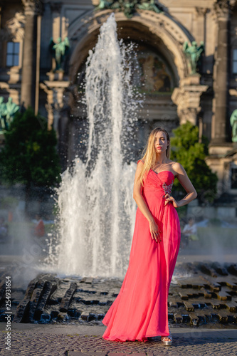 young woman in pink dress © TIGERRAW