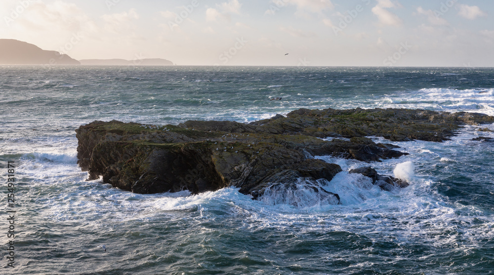 Rocky outcrop in the Irish Sea, Isle of Man, British Isles