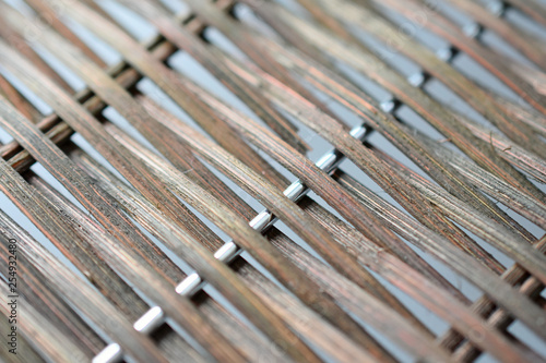 lattice of interwoven wooden rods © Vitalii
