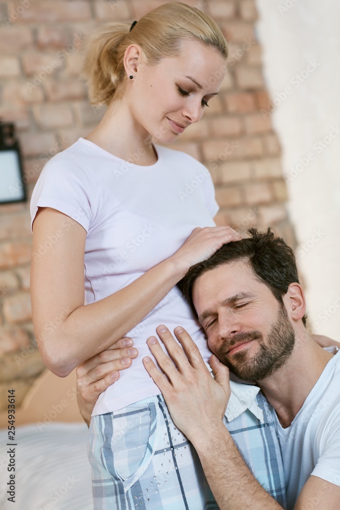 Fototapeta premium Loving couple expecting a baby
