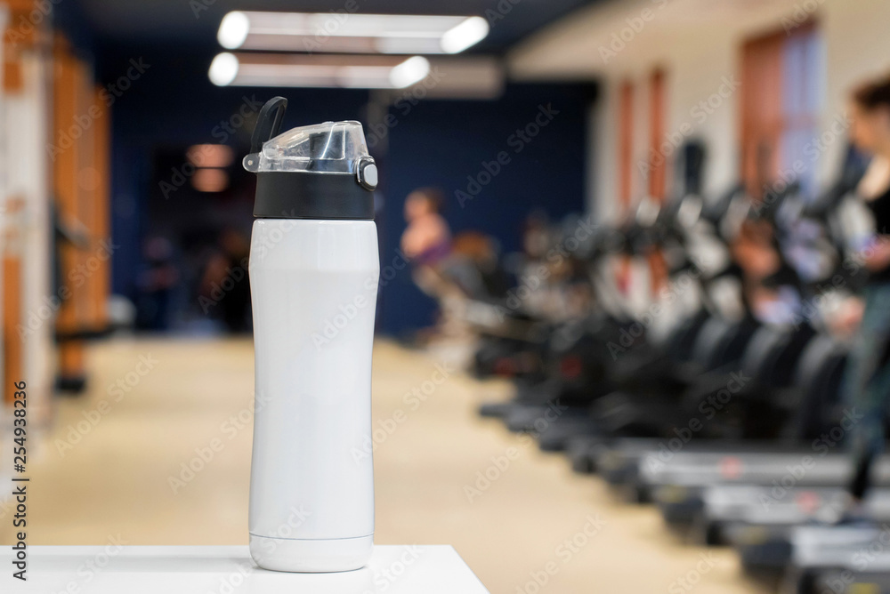 Plastic bottle or cup with fitness drink close up Plastic bottle or cup with fitness drink close up