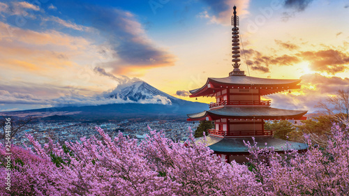 Beautiful landmark of Fuji mountain and Chureito Pagoda with cherry blossoms at sunset  Japan. Spring in Japan.