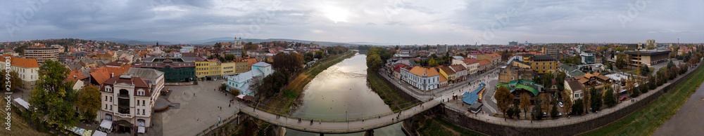 View of the river Uzh in the old bridge and cloudy sky autumn Uzhgorod, Transcarpathia, Ukraine
