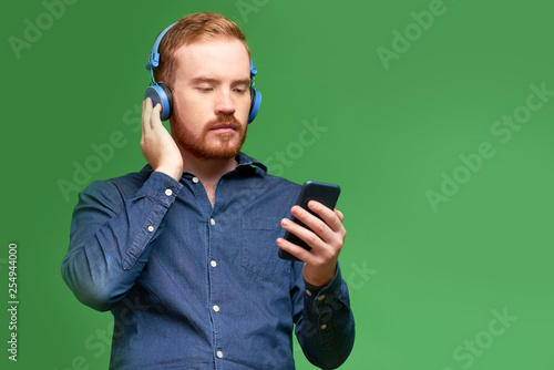 Man enjoying music via mobile app